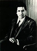 https://upload.wikimedia.org/wikipedia/commons/thumb/c/c1/Srinivasa_Ramanujan_-_OPC_-_1.jpg/130px-Srinivasa_Ramanujan_-_OPC_-_1.jpg